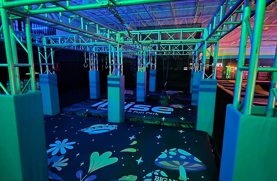 Ninja warrior course with glowing mats
